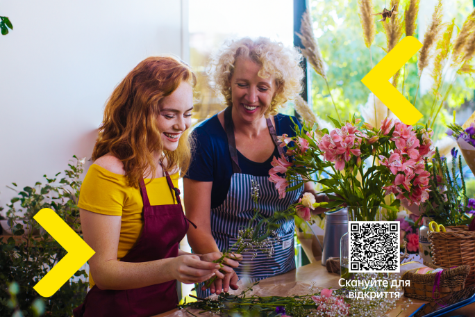 Жінки працюють у квітковому магазині